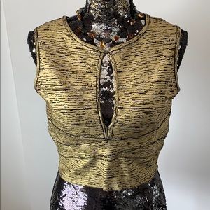 Beautiful Bebe warm gold and black cami or top